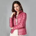 Women's Pleated Packable Rain Jacket with Light Feather Fill - Pink